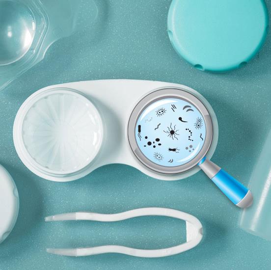 Contact lens case and tweezers with a magnifying glass showing microbes